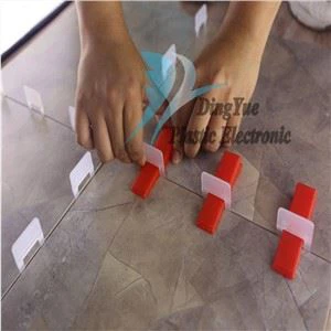 Plaatide nivelleerimise süsteemi keerdklambrid põranda sillutamiseks